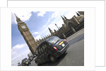 Taxi on road with big ben in background, London by Assaf Frank